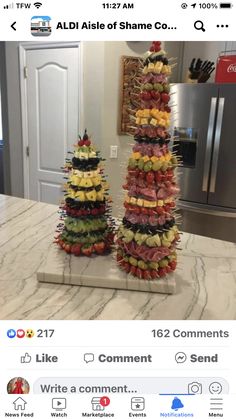 two stacks of food sitting on top of a counter