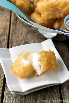 fried chicken nuggets on a white plate