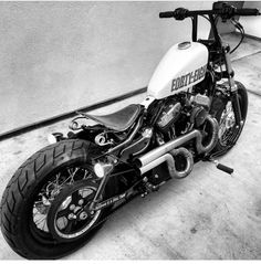 a black and white photo of a motorcycle