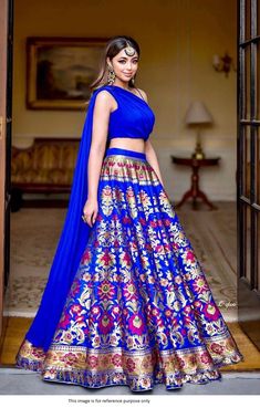 Bollywood Replica Lehenga*Lehenga in Semi-Stitched Banarasi silk fabric with Zari Weaving Work and Waist Support Up To 42  and skirt attached With Canvas ,Lehenga Closer using Drawstring with Length approximately in 41 inches and Flair in 3.5  Meter.Inner in Micro Cotton.Blouse And Dupatta Stitched.Blouse Fabric in plain Georgette with Blouse Pattern in Heart Shape and Blouse Size *Fully Stitched* Size is 38 there Extra Margin So  Can Adjust size from 36" to 42" and *Also att Latest Lahengas, Royal Blue Lehenga, Pola Blus, Western Lehenga, Mexican Quinceanera Dresses, Brocade Lehenga, Lehenga Choli Designs, Mehndi Dresses, Lehenga Choli For Women