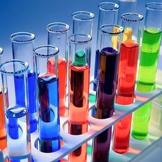 many test tubes filled with colored liquid