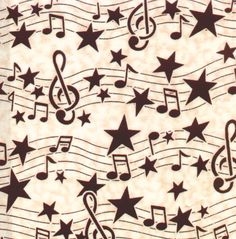 a sheet with musical notes and stars on it