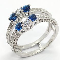 three stone diamond and blue sapphire ring