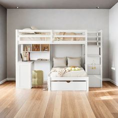 a white bunk bed sitting on top of a hard wood floor