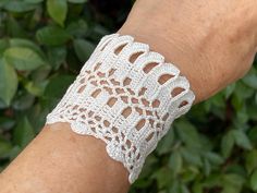 Crochet Cuff Pattern, Wrist Wrap Pattern, Crochet Bracelet, Wedding Cuff, Wrist Warmer, Button Cuff, Bridesmaid Bracelet, Cotton Crochet This pattern is for one of the crochet cuff bracelet patterns designed by me. This is a great accessory to any time. These DIY accessories make perfect gifts for you, your friends and your family.You can make this cuff bracelet by using any type of lace thread. you can adjust the size to your own wrist. The size of the bracelet depend on the thickness of the lace thread you are working with. Also, you can make bookmark or headband or choker necklace, scarf with this design. Skill level: intermediate size:  width : 6cm          length: 18cm THIS IS A DIGITAL DOWNLOADABLE FILE (PDF PATTERN TUTORIAL) - NOT A PRODUCT. ----------------------------------------- Crochet Wrist Cuffs Free Pattern, Elegant Cream Cuff Bracelet Gift, Elegant Cream Cuff Bracelet As Gift, Adjustable Cuff Bracelets For Wedding, Adjustable Cuff Bracelet For Wedding, Handmade Cuff Bracelet For Wedding, Handmade Cuff Bracelets For Weddings, Handmade Wedding Cuff Bracelet, Handmade White Cuff Bracelet