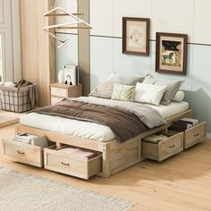 a bed with drawers underneath it in a bedroom