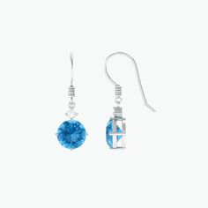 Product Details These elegant drop earrings feature stunning round shape swiss blue topaz stone, and shimmering Moissanite set in prong setting. The earrings are crafted in luxurious gold and hang from delicate fish hook backs, adding a touch of sophistication to any outfit. The beautiful blue topaz stone are offset by the glittering Moissanite, creating a mesmerizing and eye-catching look. These classic earrings are the perfect accessory for adding a pop of color and sparkle to any outfit, maki Blue Topaz Stone, Classic Earrings, Topaz Stone, Swiss Blue Topaz, Fish Hook, Blue Topaz, Prong Setting, Topaz, Color Pop