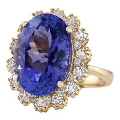 Stamped: 14K Yellow Gold Total Ring Weight: 7.3 Grams Ring Length: N/ARing Width: N/A Gemstone Weight: Total Natural Tanzanite Weight is 11.28 Carat (Measures: 16.20x11.55 mm) Color: Blue Diamond Weight: Total Natural Diamond Weight is 1.10 Carat Quantity: 28 Color: F-G, Clarity: VS2-SI1 Face Measures: 21.20x17.00 mm Sku: [703506W] Yellow Gold Tanzanite Rings With Brilliant Cut, Yellow Gold Tanzanite Diamond Ring With Halo Setting, Yellow Gold Diamond Ring With Tanzanite In Prong Setting, Yellow Gold Tanzanite Multi-stone Ring, Elegant Tanzanite Gemstones In Yellow Gold, Formal Yellow Gold Tanzanite Rings, Formal Yellow Gold Tanzanite Jewelry, Oval Tanzanite Gemstones In Yellow Gold, Oval Tanzanite Gemstones For Formal Occasions