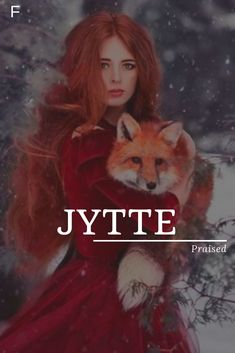 a woman in a red dress holding a fox with the words jyrte on it