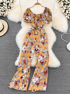 Floral Off-Shoulder Yellow Jumpsuit for Women Summer Off-shoulder Floral Jumpsuits And Rompers, Spring Off-shoulder Jumpsuits And Rompers, Trendy Off-shoulder Jumpsuits And Rompers For Summer, Trendy Off-shoulder Jumpsuits And Rompers For Spring, Casual Off-shoulder Jumpsuits And Rompers For Brunch, Spring Orange Fitted Jumpsuits And Rompers, Spring Fitted Orange Jumpsuits And Rompers, Orange Fitted Jumpsuits And Rompers For Spring, Fitted Orange Jumpsuits And Rompers For Spring