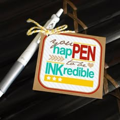 a pen is sitting on top of a piece of paper that says you have been inked