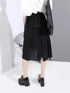 Sku CY-!60092 Material Polyester , >50%Cotton Style Loose , A-line , Empire , Original , Irregularity Feature Elasticity , Split-joint Occasion Going out , Vacation , Urban , Original Creation Seasons Spring , Summer , Autumn Type Skirts Color BLACK Size FREE SIZE Model's weight:49kg Model's height:168cm（66.14inches) Please consult the size chart we provide for this item's measurements to help you decide which size to buy.Please note: There may be 1-3cm differ due to manual measurement. INCH Waist Hips Skirt Length FREE SIZE 23.62-33.07 39.37 26.77 Black Asymmetrical Hem Skirt For Work, Versatile Black Skirt For Fall, Casual Asymmetrical Hem Bottoms For Work, Casual Bottoms With Asymmetrical Hem For Work, Casual Fake Two-piece Skirt For Summer, Trendy Black Office Skirt, Trendy Black Workwear Skirt, Trendy Black Skirt For Work, Trendy Black Skirt For Workwear