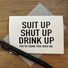 a card that says, suit up shut up drink up you're doing this with me