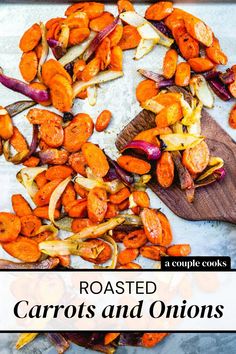 roasted carrots and onions on a cutting board with text overlay reading roasted carrots and onions