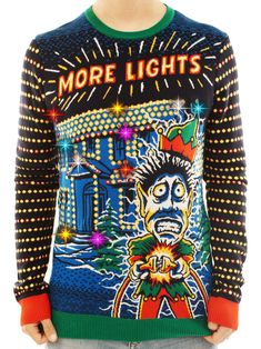 a man wearing a colorful sweater that says more lights