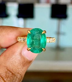 Emerald Engagement Ring Oval, Emerald Oval Engagement Ring, Oval Emerald Ring, Luxury Dazzling Emerald Ring, Luxury Domed Green Emerald Ring, Luxury Polished Emerald Ring, Fine Jewelry Emerald Ring, Oval Shape For Everyday, Luxury Polished Emerald Ring, Elegant Style, Zambian Emerald