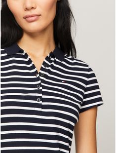 Tommy Hilfiger women's polo. Our classic stripe polo is a key part of the Hilfiger heritage—as relevant today as is was in 1985. This version is designed in a trim, flattering fit from comfortable stretch cotton.  Material: 97% Regenerative Cotton. Fitted Tommy Hilfiger Cotton Tops, Fitted Tommy Hilfiger Polo Collar Top, Tommy Hilfiger Casual V-neck Top, Fitted Tommy Hilfiger V-neck Tops, Casual Tommy Hilfiger Cotton T-shirt, Tommy Hilfiger Store, Tommy Hilfiger Women, Cotton Polo, Stretch Cotton