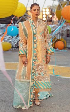 comes in a unique style to wear on your eid day with its stunning printed base and stylish trousers combines with a designed heavy dupatta of premium quality fabric.Shirt: Our Pakistani Eid Dress is designed in a long shirt that is Fully embroidered from the front on the dyed lawn with Embroidered neckline from the front on the organza. Also, it has a Heavy embroidered daman border for the front on the lawn. The printed Exaggerated back is also scrutinized as very pretty with a Printed border fo Cotton Kurti Design, New Kurti, Pakistani Dresses Online, Pakistani Clothes, Latest Kurti, Frock Fashion, Trendy Shirt Designs, Beech Tree, Pakistani Fashion Casual