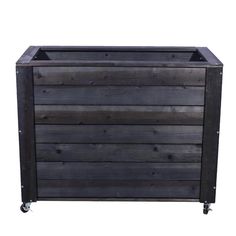 a black wooden cabinet with wheels on the bottom and sides, against a white background