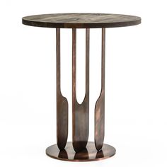 a wooden table with two metal utensils sitting on it's pedestals