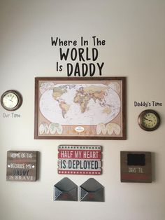 there is a world map on the wall with words above it and other things below