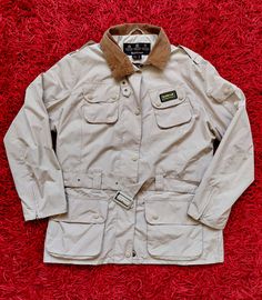 For sale is Preowned Vintage 90's Barbour International Womens Waterproof Rain Jacket Size L in very good Condition Please check All Measurement and pictures- USA & Canada: We aim to deliver your order within 5 - 8 workingdays. - East Europe: We aim to deliver your order within 2 - 5 working days Classic Long Sleeve Windbreaker For Outdoor, Classic Khaki Windbreaker For Outdoor, Adventure Long Sleeve Outerwear With Pockets, Vintage Outerwear For Hiking In Fall, Long Sleeve Adventure Outerwear With Pockets, Vintage Outerwear For Fall Hiking, Vintage Fall Outerwear For Hiking, Long Sleeve Outerwear With Pockets For Adventure, Vintage Fall Hiking Outerwear