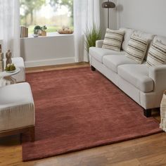 a living room scene with focus on the rug