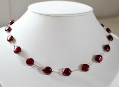 "This beautiful red coin pearl statement necklace is handcrafted by me. Perfect Mothers Day gift from husband or 30th anniversary gift for wife! Lovingly hand knotted by me using beige silk cord. It is very elegant and light weight to wear. I knot between each ruby/maroon colored coin pearl to achieve a floating effect. The coin pearls are approximately 9mm in size. The length is approximately 18\". These coin pearls have a very nice luster to them. The clasp and jump ring are sterling silver. P Red Pearl Necklace Gift, Adjustable Red Pearl Necklace Gift, Elegant Red Pearl Necklace Gift, Handmade Adjustable Pearl Necklace For Anniversary, Handmade Adjustable Red Pearl Necklace, Adjustable Handmade Red Pearl Necklace, Elegant Red Round Pearl Necklace, Handmade Red Necklaces For Anniversary, 30th Anniversary Gifts