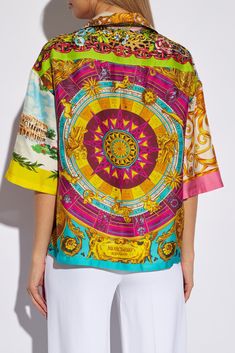 Multicolored shirt from Moschino. Made of silk, this loose-fitting design features buttons, a decorative print, front pocket and short sleeves. Composition: 100% Silk Designer Printed Short Sleeve Shirt, Summer Silk Shirt With Graphic Print, Designer Printed Summer Shirt, Designer Summer Printed Blouse, Designer Short Sleeve Multicolor Shirt, Designer Multicolor Camp Collar Shirt, Designer Multicolor Shirt With Camp Collar, Designer Multi-color Shirt With Camp Collar, Designer Summer Blouse In Relaxed Fit