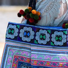 This bag makes us want to go places. Beach day, overnight or just hauling all of lifes necessities - we've got you covered, babe. This gorgeous blue tote bag is hobo style, so it is unstructured. We love the unique design on this travel bag plus the little pom pom's on the straps make it perfection. We know you will fall in love with our colorful boho beach bags. Handmade in Thailand with vintage Hmong embroidery that is woven by the Hmong Hill Tribes of Lanna Country (Northern Thailand). SPECIF Hmong Embroidery, Boho Blue, Blue Tote Bag, Northern Thailand, Bags Handmade, Hobo Style, Blue Tote, Blue Beach, Beach Bags