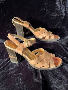 Vintage 1970s stacked heel strappy leather sandals high heels. Normal wear for their age women's size 7 Vintage Sandals With Block Heel For Spring, Vintage Block Heel Sandals For Spring, Vintage Open Heel Sandals For Summer, Vintage Stacked Heel Summer Heels, Vintage Open Toe Sandals With Buckle, Vintage Open Toe Sandals With Buckle Closure, Retro Heels With Ankle Strap And Heel Loop, Vintage Ankle Strap Sandals For Spring, Vintage Sandals With Block Heel And Heel Strap