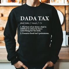 Funny Dad Definition Sweatshirt, Dad Tax Shirt, Tax Noun Shirt, Funny Dad Shirt, Fathers Day Gift, Dad Definition Tee, Best Father Shirt      Hi! Welcome to the LaTeeApparel! It's great to see you here! Our shirts are clean, high quality and soft. It is prepared quickly by our store! Enjoy your shopping! It is a pleasure for us to help you with your questions and you can reach us at any time. F I T  ∙ S I Z I N G  -->Women's sizes are narrower than the waist -->Sleeves are rolled up in some prod Father's Day Long Sleeve Letter Print T-shirt, Father's Day Long Sleeve T-shirt With Letter Print, Long Sleeve T-shirt With Letter Print For Father's Day, Long Sleeve Slogan Shirt In Relaxed Fit, Father's Day Long Sleeve T-shirt With Name Print, Long Sleeve Top With Text Print For Father's Day, Funny Long Sleeve Shirt With Letter Print, Gift Black Long Sleeve Shirt, Black Long Sleeve Shirt Gift