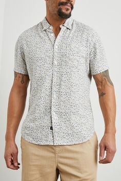 This ultra comfortable, laidback shirt is perfect for any occasion from work to weekend. Made from a lightweight linen blend, this short sleeve button-down shirt features a single patch pocket at chest.    Relaxed fit55% Linen 45% Rayon    Machine wash cold. Line dry. Do not bleach. Cool iron if needed. Casual Short Sleeve Shirt With Spread Collar, Casual Short Sleeve Shirt With Welt Pockets, Cotton Short Sleeve Shirt With Welt Pockets, Cotton Short Sleeve Shirt With Welt Pockets For Summer, Summer Cotton Short Sleeve Shirt With Welt Pockets, Linen Shirt For Business Casual In Summer, Spring Short Sleeve Shirt For Casual Gatherings, Casual Cotton Short Sleeve Shirt With Rolled Sleeves, Casual White Linen Short Sleeve Shirt