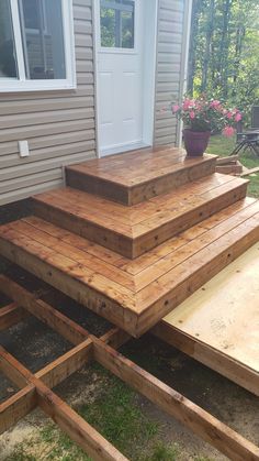 some wooden steps in front of a house