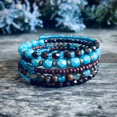 This is For all you beautiful boho lovers! This gorgeous memory wire bracelet is made with mix of Czech glass, seed beads, brass beads, and gemstone beads. This beautiful pop of blue color will surely create a statement! It can be stacked with other bracelets to create a truly unique look. All of the bracelets are one of a kind! They are perfect for gifting and already comes it a gift box! 🎁Memory wire bracelets will fit any wrist size and will never loose its shape. #etsyshop #bohemianstyle #b Stackable Wrap Bracelet For Layering, Adjustable Faceted Beads Bracelets For Layering, Adjustable Multi-strand Bracelets With Faceted Beads, Adjustable Multi-strand Wire Wrapped Beaded Bracelets, Bohemian Bracelets For Layering, Spiritual Multi-strand Faceted Beads Bracelets, Spiritual Multi-strand Bracelets With Faceted Beads, Turquoise Multi-strand Bracelets With Faceted Beads, Adjustable Hand Wrapped Beaded Bracelets