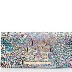 The Ady Wallet Is Exactly What You Have Been Searching For. Super Sleek And Light Weight With Plenty Of Credit Card Slots And A Zip Pocket For Your Change. Extremely Functional With Its Flat Design, Perfect For Fitting In Your Favorite Clutch Or Crossbody. Design Notes Featured In Mother Of Pearl Melbourne, A Stunning Iridescent Coloration That Shines From Every Angle. Genuine Croc-Embossed Leather. 13 Credit Card Slots 1 Id Slot Dimensions 7.5″ W 3.75″ H 0.5″ D Leather Credit Card Wallet, Rainbow Snake, Red Flare, Brahmin Bags, Checkbook Wallet, Sweet Love Quotes, Credit Card Wallet, Slim Wallet, Purses Designer