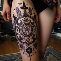 a woman's thigh with tattoos on it and an image of a pentagramil