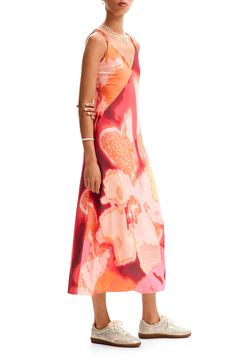 An abstract pattern with washed-out blooms brightens your day every time you choose this flowy slipdress with strappy details. Slips on over head Deep V-neck Adjustable straps 94% polyester, 6% elastane Machine wash, line dry Imported Casual Floral Print Slip Dress For Summer, Casual Summer Floral Print Slip Dress, Casual Floral Print Slip Dress For Spring, Casual Summer Slip Dress With Floral Print, Floral Print Summer Slip Dress, Spring Printed Slip Dress With Spaghetti Straps, Summer Vacation Slip Dress With Floral Print, Spring Summer Halter Neck Slip Dress, Summer Slip Dress With Halter Neck For Spring