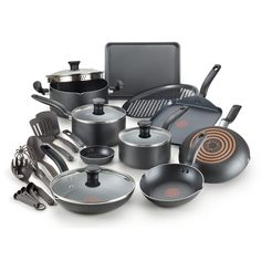 an assortment of pots and pans on a white background with no one in the photo