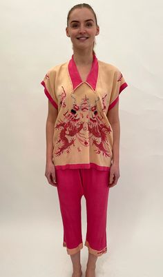 These 1920s to 1930s Japanese export silk pyjamas are in shades of pink and beige and have an embroidered design of dragons to the front of the top and embroidered floral motifs to the bottom of the trousers. The waist is elasticated.  This set will fit a variety of sizes. When laid flat the measurements are: Trousers/pants:  Length: just under 34" inches Across the waist with elastic at maximum stretch: 20" inches, when the elastic is relaxed it is 12" inches across the waist Across the hips: 2 1920s Pyjamas, Beach Pyjamas, Pyjamas Silk, 30s Dress, Silk Pyjamas, Womens Pajama, Pyjama Sets, Beautiful Kimonos, Color Run