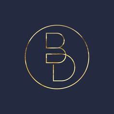 the letter b in a gold circle on a black background with a dark blue background