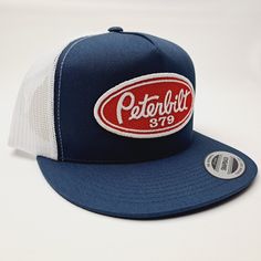 Brand new high-quality embroidered patch on a mesh trucker snapback hat Breathable Trucker Snapback Hat, Breathable Snapback Trucker Hat, Blue Trucker Hat With Embroidered Logo, Trucker Snapback Hat With Embroidered Logo And Curved Brim, Trucker Snapback Hat With Patches For Streetwear, Trucker Style Snapback Hat With Patches For Streetwear, Breathable Trucker Hat With Flat Bill, Retro Trucker Hat With Embroidered Logo And Curved Bill, Trucker Baseball Cap With Embroidered Logo And Curved Bill