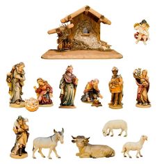 a nativity scene with figurines and animals