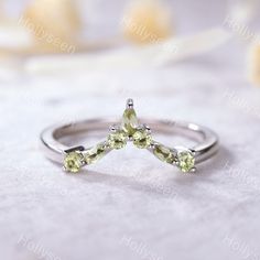 an image of a ring with three stones on it