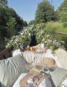 a boat filled with lots of furniture and flowers