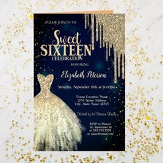 a blue and gold sweet sixteen birthday party with sparkles on the table, including an elegant gown