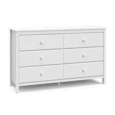 a white dresser with four drawers and two pulls on the bottom, in front of a white background