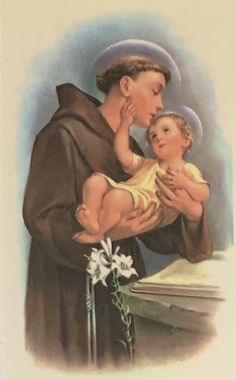 a painting of a saint holding a baby