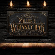 the miller's whiskey bar sign is lit up in front of a wooden table