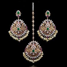 This set comes with a promise of dressing you up in an instant and lends the perfect wedding worthy vibe! The remarkable Ruhya Set is a beautiful and lucid piece featuring glistening ruby and emerald stones together with pearl moti. Approximate earrings length is 4". Gold-plated on high-quality brass as base metal. Made by order. Kindly allow 4-6 weeks for the delivery of this item. For custom or urgent requests, please contact support@alacouture.com. *Please Note: We use faux stones and beads i Heritage Jewellery, Lab Created Emerald, Faux Stone, Head Accessories, Emerald Stone, The Perfect Wedding, Cz Stone, Base Metal, Perfect Wedding